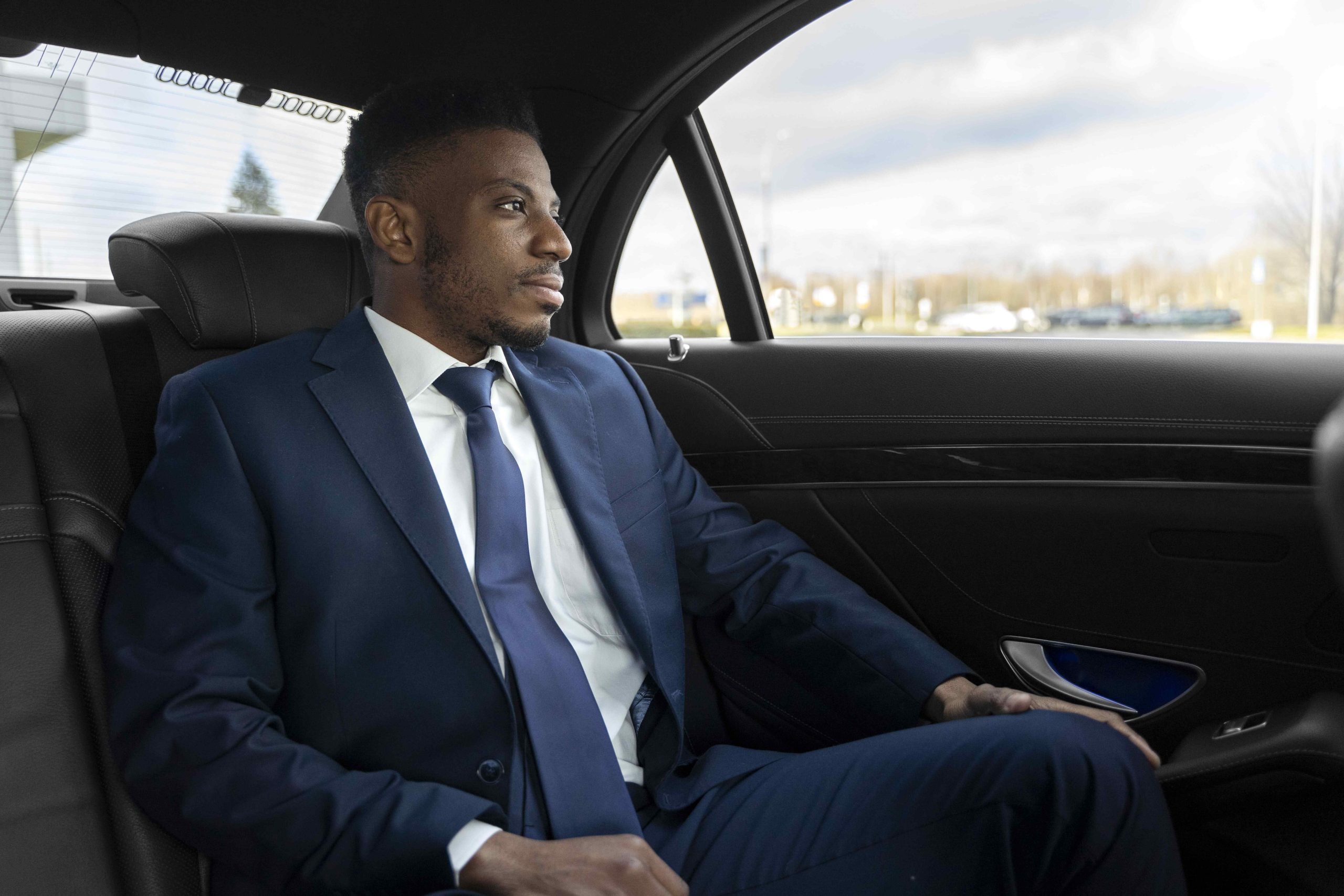 elegant uber driver giving taxi ride 1 2 scaled